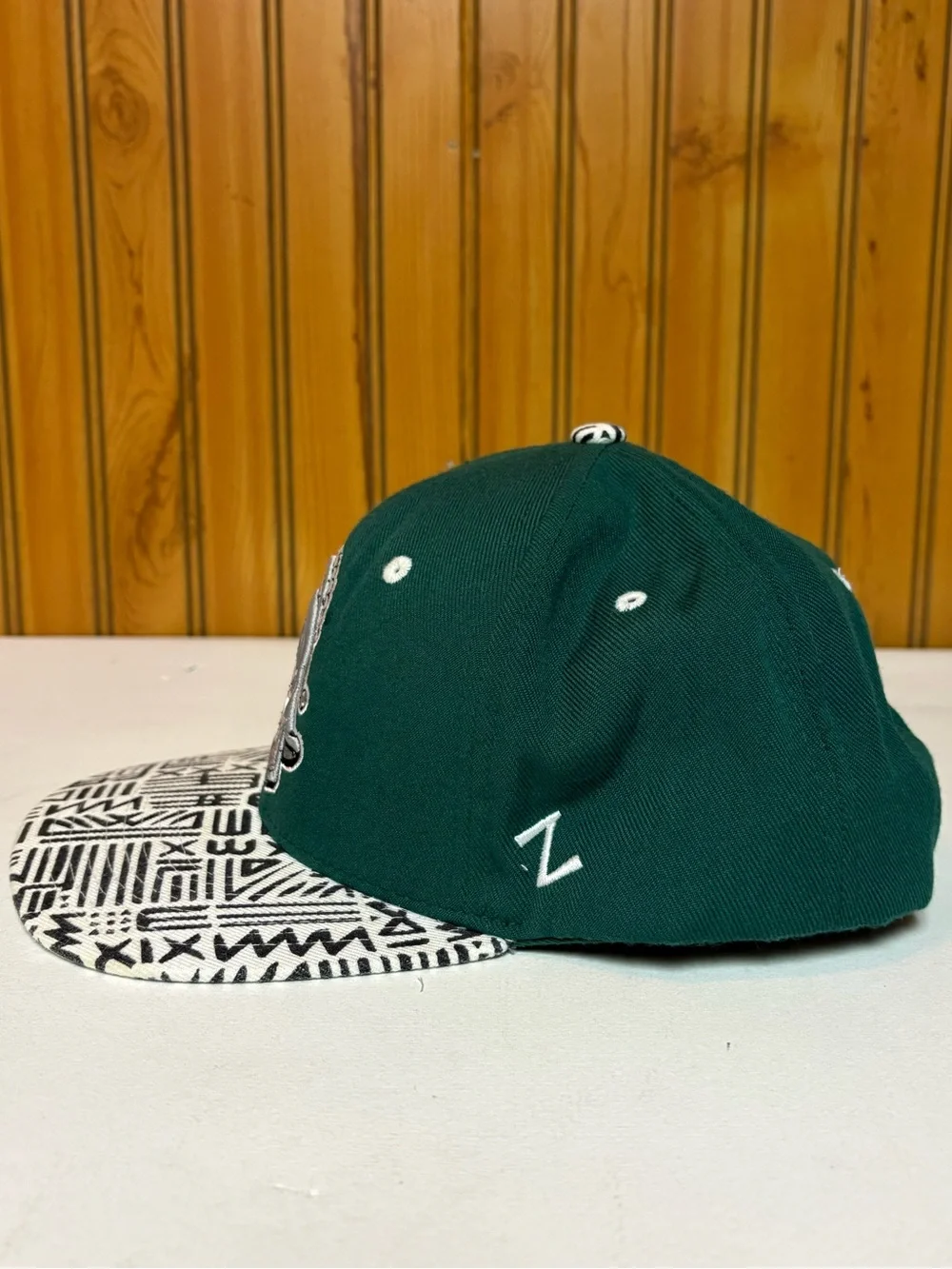 Zephyr Green Hat with Red and Navy Logo Patch